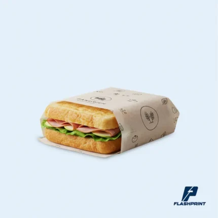 alt="empaque personalizado para sándwich con logo de marca en papel kraft"