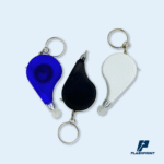 alt="Llavero con wincha y mini lapicero personalizado con logo"