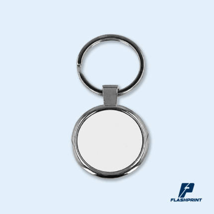 alt="Llavero metálico circular personalizado con logo"